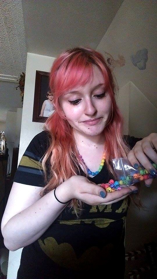 cute redhead with skull beads