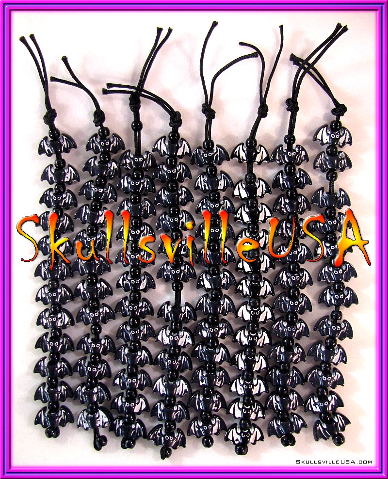 white washed black bat bead strands